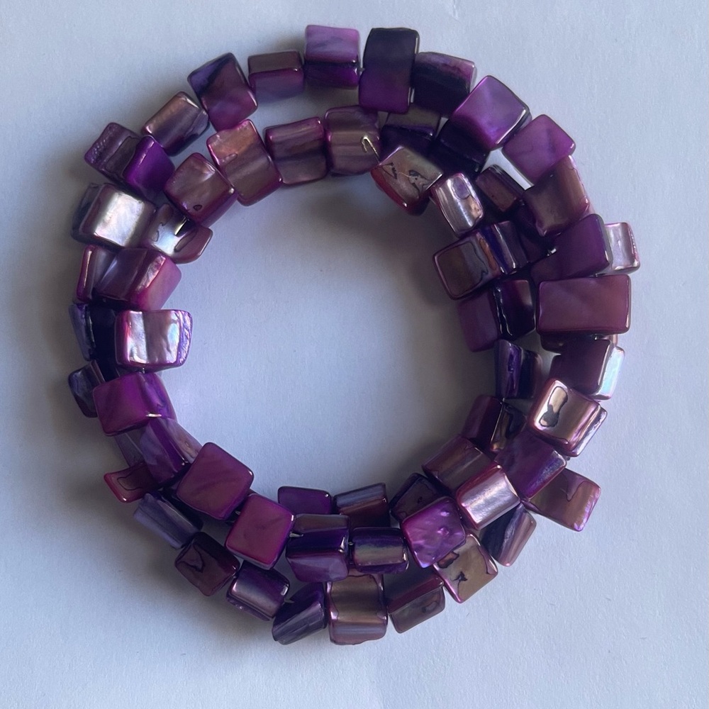 Wide Spiral Purple Shell Nugget Multistrand Flex
Bracelet - Adjustable